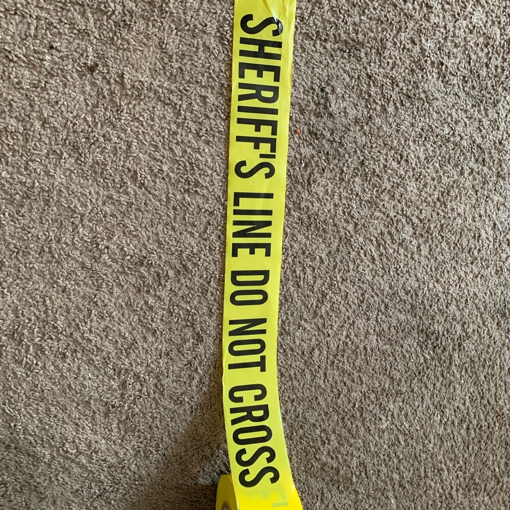 SHERRIF'S LINE DO NOT CROSS TAPE